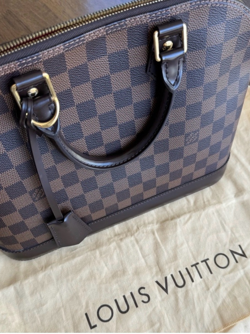 Louis Vuitton Damier Ebene Alma PM Satchel Bag